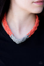 Load image into Gallery viewer, Strands of orange seed beads create an indigenous braid below the collar. The orange seed beads gradually morph into metallic silver beads at the center for a chic contrasting look. Features an adjustable clasp closure.  Sold as one individual necklace. Includes one pair of matching earrings.
