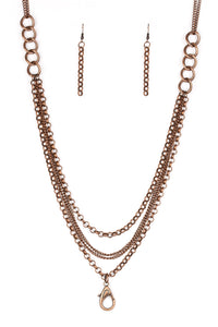 Bold copper chain links give way to layers of mismatched copper chain, creating a dramatic industrial collision. A lobster clasp hangs from the bottom of the design to allow a name badge or other item to be attached. Features an adjustable clasp closure. Sold as one individual lanyard. Includes one pair of matching earrings.