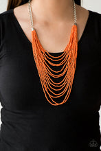 Load image into Gallery viewer, Row after row of vivacious orange seed beads cascade down the chest, creating summery layers. Features an adjustable clasp closure.  Sold as one individual necklace. Includes one pair of matching earrings.
