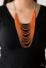 Load image into Gallery viewer, Row after row of refreshing orange seed beads cascade down the chest, creating summery layers. Features an adjustable clasp closure.   Sold as one individual necklace. Includes one pair of matching earrings.
