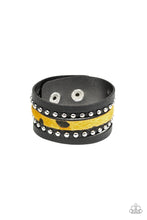 Load image into Gallery viewer, A thick band of black leather has been spliced into layered bands that have been studded and printed in a fuzzy cheetah print for a wild look. Features an adjustable snap closure.  Sold as one individual bracelet.
