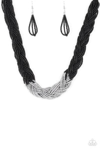 Strands of black seed beads create an indigenous braid below the collar. The black seed beads gradually morph into metallic silver beads at the center for a chic contrasting look. Features an adjustable clasp closure.  Sold as one individual necklace. Includes one pair of matching earrings.