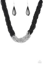 Load image into Gallery viewer, Strands of black seed beads create an indigenous braid below the collar. The black seed beads gradually morph into metallic silver beads at the center for a chic contrasting look. Features an adjustable clasp closure. Sold as one individual necklace. Includes one pair of matching earrings.
