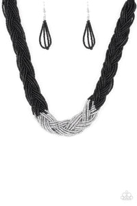 Strands of black seed beads create an indigenous braid below the collar. The black seed beads gradually morph into metallic silver beads at the center for a chic contrasting look. Features an adjustable clasp closure. Sold as one individual necklace. Includes one pair of matching earrings.