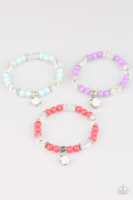 Load image into Gallery viewer, Colored beads with clear beads, silver accent beads, with a white rose that dangles on a stretchy bracelet.

