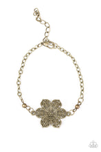 Load image into Gallery viewer, Featuring filigree filled petals, a glistening brass flower adorns the center of the wrist for a seasonal look. Features an adjustable clasp closure.
