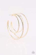 Load image into Gallery viewer, Featuring diamond-cut textures, two glistening gold bars curl into a bold hoop for a flawless finish. Earring attaches to a standard post fitting. Hoop measures 2 3/4” in diameter. Sold as one pair of hoop earrings.
