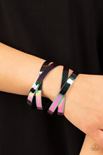 Load image into Gallery viewer, Industrial Imagination Bracelet - Burnished in a sleek oil spill finish, two sets of flat metal bands criss-cross over the wrist as they wrap into a lustrous cuff giving off an industrial vibe.
