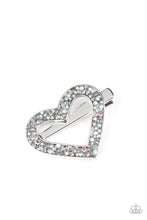 Load image into Gallery viewer, A glittery collision of hematite and purple iridescent rhinestones scatter across the front of a shiny silver heart frame for a colorful look. Features a standard hair clip on the back.  Sold as one individual hair clip.
