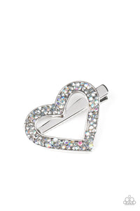 A glittery collision of hematite and purple iridescent rhinestones scatter across the front of a shiny silver heart frame for a colorful look. Features a standard hair clip on the back.  Sold as one individual hair clip.