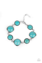 Load image into Gallery viewer, Featuring studded and plain silver frames, small and large turquoise stones delicately alternate around the wrist for a rustic flair. Features an adjustable clasp closure.
