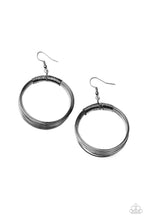 Load image into Gallery viewer, Dainty gunmetal wire delicately wraps around layers of coiled gunmetal wire, creating an edgy hoop. Earring attaches to a standard fishhook fitting. Sold as one pair of earrings.
