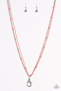 Painted in a refreshing coral finish, dainty ball-chains and a shimmery silver satellite chain drapes across the chest for a colorful industrial look. A lobster clasp hangs from the bottom of the design to allow a name badge or other item to be attached. Features an adjustable clasp closure.  Sold as one individual lanyard. Includes one pair of matching earrings.