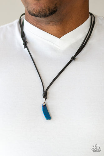 A metallic chunk of blue rock swings from the bottom of a lengthened strand of black leather cording, creating an urban pendant. Features an adjustable sliding knot closure. Size may vary. Sold as one individual necklace.