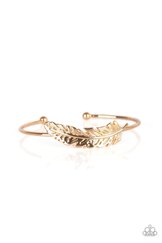 Featuring life-like detail, a shimmery gold feather folds along a dainty silver cuff for a seasonal look.  Sold as one individual bracelet.