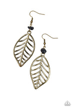 Load image into Gallery viewer, An airy brass leaf swings from the bottom of an earthy black pebble, creating a seasonal lure. Earring attaches to a standard fishhook fitting.  Sold as one pair of earrings.
