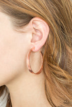Load image into Gallery viewer, Three flat shiny copper bars curl into a bold industrial hoop. Earring attaches to a standard post fitting. Hoop measures 2&quot; in diameter.  Sold as one pair of hoop earrings.
