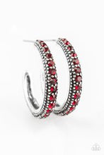 Load image into Gallery viewer, Encrusted in dazzling red rhinestones, a studded silver hoop swings from the ear for a glamorous look. Earring attaches to a standard post fitting. Hoop measures 1" in diameter. Sold as one pair of hoop earrings.
