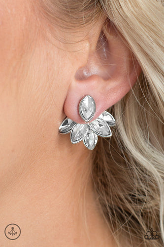 Pressed into a sleek silver frame, a solitaire white gem attaches to a double-sided post, designed to fasten behind the ear. Featuring matching marquise shaped frames , the stacked double-sided post peeks out beneath the ear, creating a glittery fringe. Earring attaches to a standard post fitting.  Sold as one pair of double-sided post earrings.