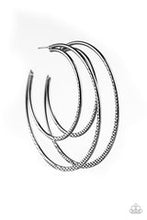 Load image into Gallery viewer, Featuring diamond-cut textures, two glistening gunmetal bars curl into a bold hoop for a flawless finish. Earring attaches to a standard post fitting. Hoop measures 2 3/4” in diameter. Sold as one pair of hoop earrings.
