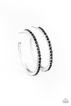 Load image into Gallery viewer, Encrusted in glassy black rhinestones, a textured silver hoop curls around the ear for a refined look. Earring attaches to a standard post fitting. Hoop measures 1 3/4&quot; in diameter.  Sold as one pair of hoop earrings.
