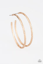 Load image into Gallery viewer, Etched in ribbons of diamond-cut shimmer, a shiny gold hoop curls around the ear for a classic look. Earring attaches to a standard post fitting. Hoop measures 2 1/4&quot; in diameter. Sold as one pair of hoop earrings.
