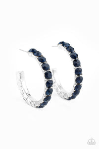 An oversized collection of glittery blue rhinestones are encrusted along a textured silver hoop, creating a glamorous sparkle. Earring attaches to a standard post fitting. Hoop measures approximately 1 1/2" in diameter.  Sold as one pair of hoop earrings.