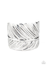 Load image into Gallery viewer, Embossed in life-like texture, an antiqued silver feather delicately curls around the wrist, creating a whimsical cuff.  Sold as one individual bracelet.
