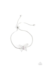 Load image into Gallery viewer, A deceptively simple silver butterfly charm glides along a silver snake chain for a whimsical flair along the wrist. Dainty, iridescent rhinestones encrust along the butterfly&#39;s body, creating an understated shimmer, while intricate, airy wings fold out from the sparkle, adding a 3D effect to the design. Features an adjustable sliding knot closure. Due to its prismatic palette, color may vary.  Sold as one individual bracelet.

