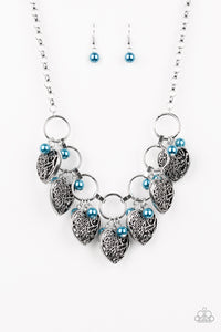 Infused with classic blue pearls, vintage locket-like heart frames swing from the bottoms of bold silver hoops, creating a flirtatious fringe below the collar. Features an adjustable clasp closure.  Sold as one individual necklace. Includes one pair of matching earrings.