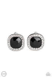 A border of glassy white rhinestones spins around a black gem center for a refined flair. Earring attaches to a standard clip-on fitting.  Sold as one pair of clip-on earrings.
