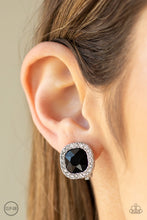 Load image into Gallery viewer, A border of glassy white rhinestones spins around a black gem center for a refined flair. Earring attaches to a standard clip-on fitting.  Sold as one pair of clip-on earrings.
