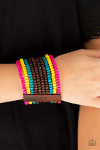 Load image into Gallery viewer, Infused with rectangular wooden beads, a collection of blue, brown, pink, and yellow wooden beads are threaded along stretchy bands for a summery flair.  Sold as one individual bracelet.
