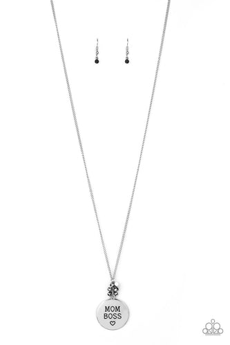 Infused with a cluster of glittery hematite rhinestones, a shimmery silver disc is stamped with the inspirational phrase, 