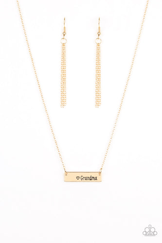 A shimmery gold frame stamped with the word, 