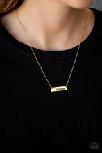 Load image into Gallery viewer, A shimmery gold frame stamped with the word, &quot;Grandma&quot;, is suspended horizontally below the collar for a sentimental fashion. Features an adjustable clasp closure.  Sold as one individual necklace. Includes one pair of matching earrings.

