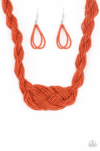 Countless strands of orange seed beads are twisted and knotted together to create an unforgettable statement piece. Features an adjustable clasp closure. Sold as one individual necklace. Includes one pair of matching earrings.