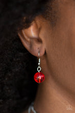 Load image into Gallery viewer, Single red bead hanging from a fish hook earring.
