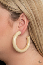 Load image into Gallery viewer, Painted in a shiny white finish, a thick wooden frame dramatically curls into an oversized hoop for a colorfully retro look. Earring attaches to a standard post fitting. Hoop measures approximately 2 1/2" in diameter.  Sold as one pair of hoop earrings.

