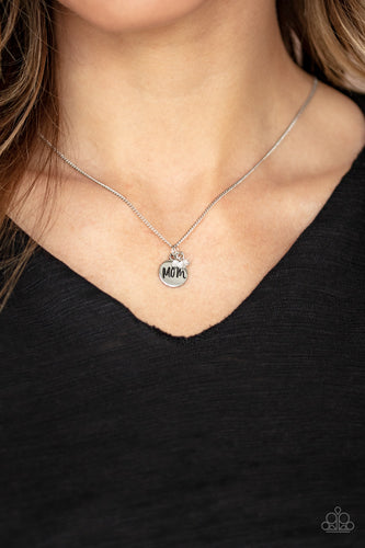A dainty cluster of white crystal-like beads and dainty silver disc stamped in the word, 