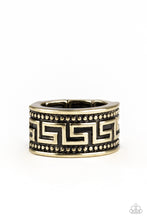Load image into Gallery viewer, A thick brass band is studded and embossed in a tribal inspired pattern for an edgy look. Features a stretchy band for a flexible fit.  Sold as one individual ring.
