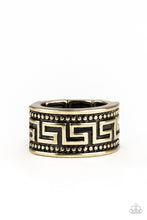 Load image into Gallery viewer, A thick brass band is studded and embossed in a tribal inspired pattern for an edgy look. Features a stretchy band for a flexible fit.  Sold as one individual ring.
