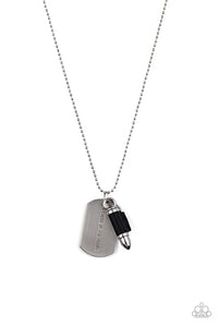 Pinched between a black leather fitting, a silver bullet pendant joins a silver dog tag at the bottom of a silver ball chain. The shimmery dog tag is stamped in the phrase, "Because of the Brave," for a patriotic finish. Features a ball and clasp closure.  Sold as one individual necklace.