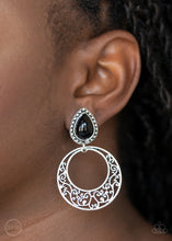 Load image into Gallery viewer, Filled with vine-like filigree, an airy silver hoop dangles from the bottom of a studded silver frame dotted with a black teardrop bead for a whimsical fashion. Earring attaches to a standard clip-on fitting.  Sold as one pair of clip-on earrings.
