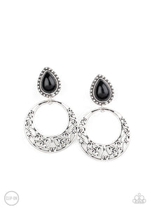 Filled with vine-like filigree, an airy silver hoop dangles from the bottom of a studded silver frame dotted with a black teardrop bead for a whimsical fashion. Earring attaches to a standard clip-on fitting.  Sold as one pair of clip-on earrings.