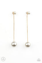 Load image into Gallery viewer, Attached to a sleek gold chain, an oversized white pearl delicately swings from the bottom of a classic white pearl, adding a timeless twist to the elegant display. Earring attaches to a standard post fitting.  Sold as one pair of post earrings.
