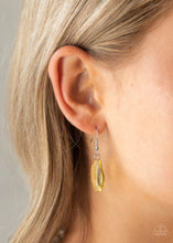 Load image into Gallery viewer, Opaque yellow circle hanging from a silver fish hook earring.
