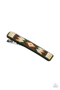 A dainty collection of Military Olive, Fired Brick, white, Almond Oil, and Rose Tan beads delicately embellish the front of a black frame, stacking into a colorful textile pattern. Features a standard hair clip on the back.  Sold as one individual hair clip.