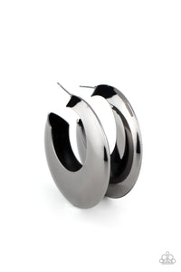 Two flat gunmetal crescent frames delicately connect into a hollowed out hoop for a dramatic finish. Earring attaches to a standard post fitting. Hoop measures approximately 2 3/4" in diameter.  Sold as one pair of hoop earrings.