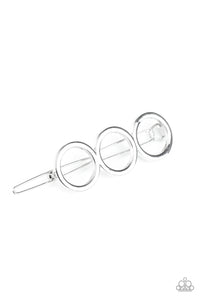 A trio of silver rings delicately connect into an airy minimalist inspired frame. Features a clamp barrette closure.  Sold as one individual hair clip.